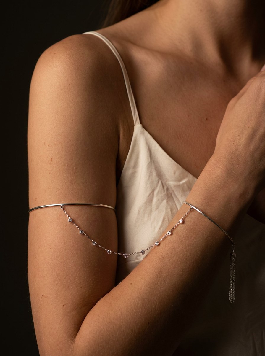Gentle Bind — upper arm band joined to a wrist band by a fine chain