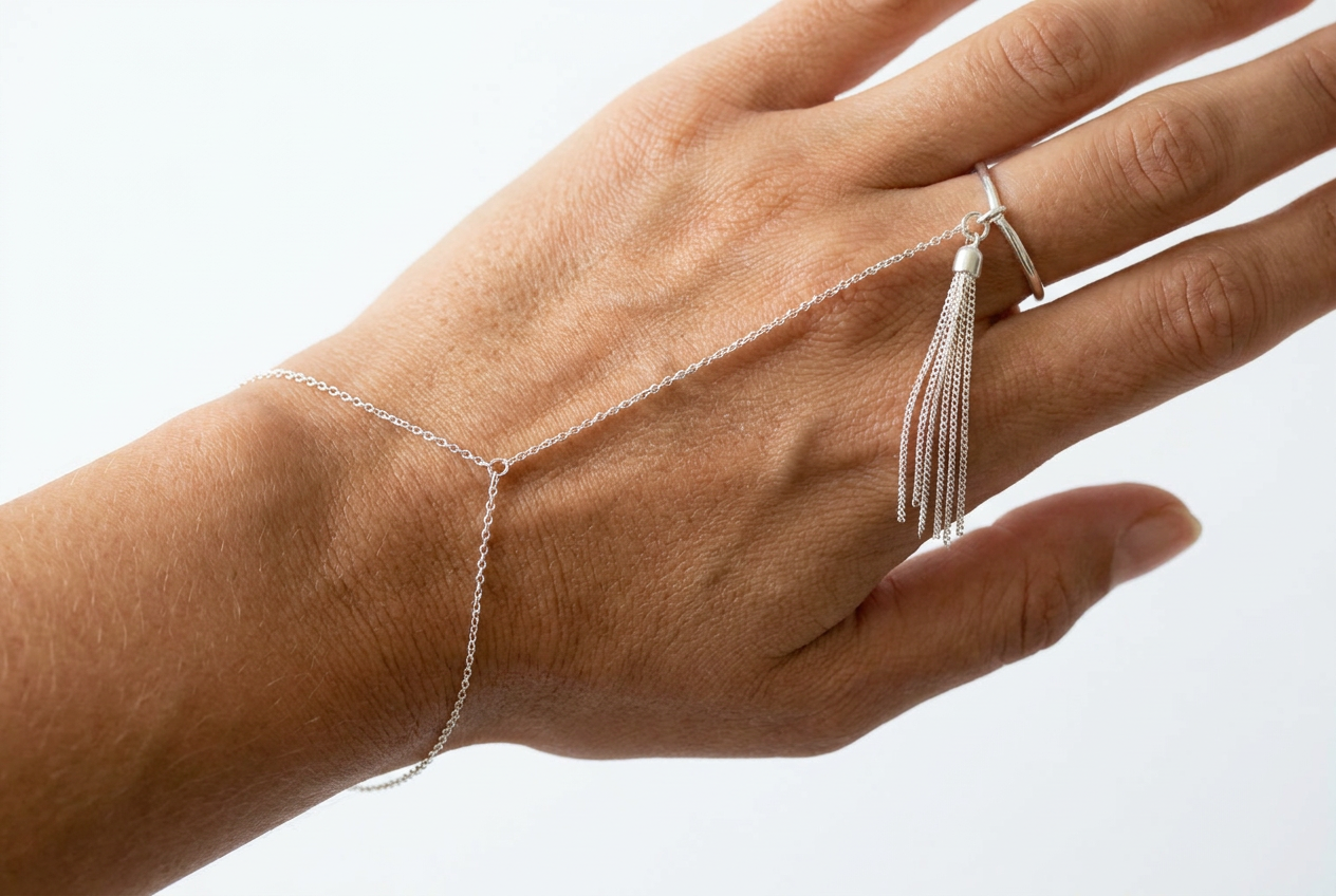Soft Knot — silver hand chain with fringe tassels